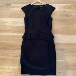 Black peplum cocktail dress